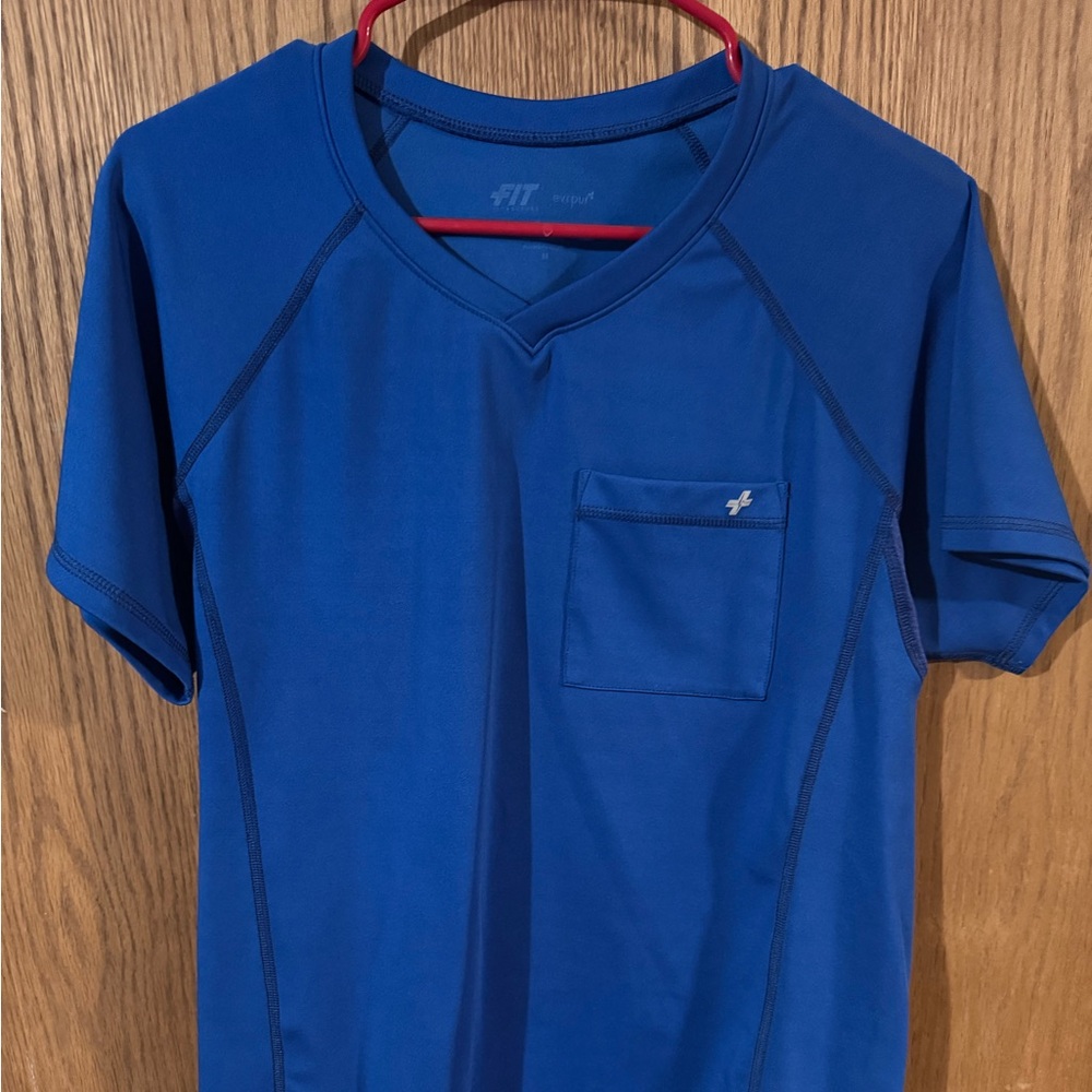 Blue Fit Scrubs men’s top. Silver thread for bacteria resistance.
